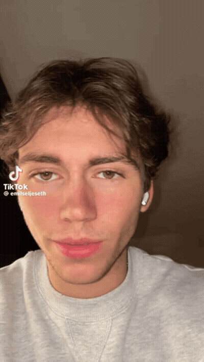 Young Man's Face With TikTok Sticker GIF