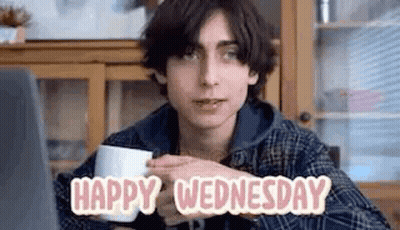 Young Man Saying Happy Wednesday With Coffee GIF