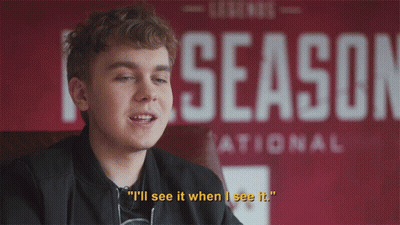 Young Man Says I'll See It When I See It In Front Of National Sign GIF