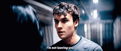Young Man Says I'm Not Leaving You To Woman In Dark Hallway GIF