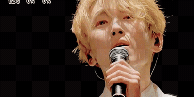 Young Man Singing Into Microphone GIF