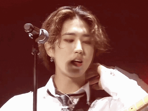 Young Man Singing Into Microphone GIF