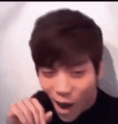 Young Man Singing With Funny Face GIF