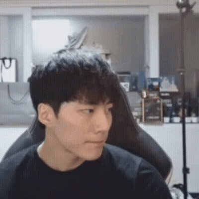 Young Man Sitting At Computer GIF