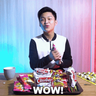 Young Man Sitting At Table With Chuba Snacks Saying Wow GIF