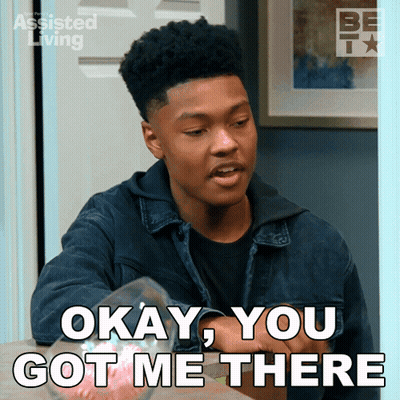 Young Man Sitting With Candy Bag GIF