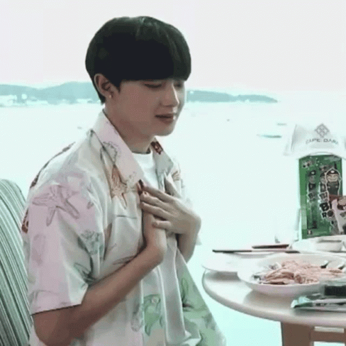 Young Man Sitting With Food GIF