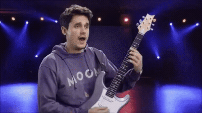 Young Man Sitting With Guitar GIF