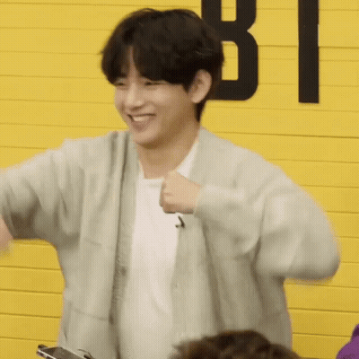 Young Man Smiling And Dancing GIF