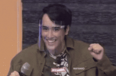 Young Man Smiling And Dancing GIF