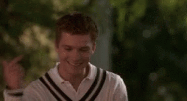 Young Man Smiling And Pointing GIF