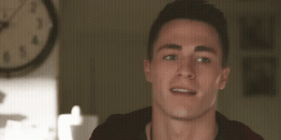 Young Man Smiling At Clock GIF