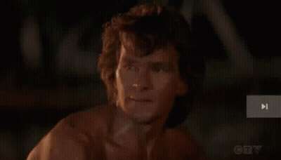 Young Man Smiling At Table GIF