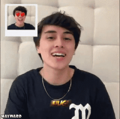 Young Man Smiling In Black Shirt With M GIF
