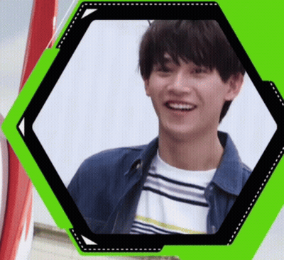 Young Man Smiling In Denim Jacket GIF