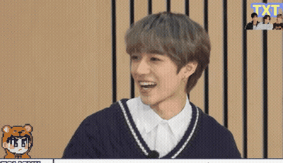 Young Man Smiling In Front Of Screen Saying Txt GIF