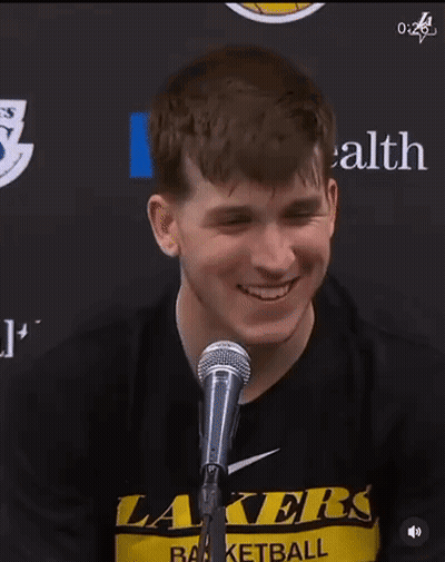 Young Man Smiling In Lakers Shirt GIF