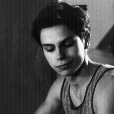 Young Man Smiling In Tank Top GIF
