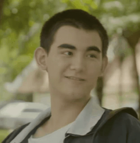 Young Man Smiling Wearing Backpack GIF