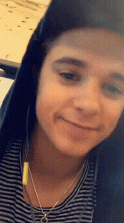 Young Man Smiling With Headphones GIF