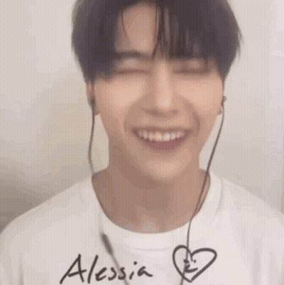 Young Man Smiling With Headphones GIF