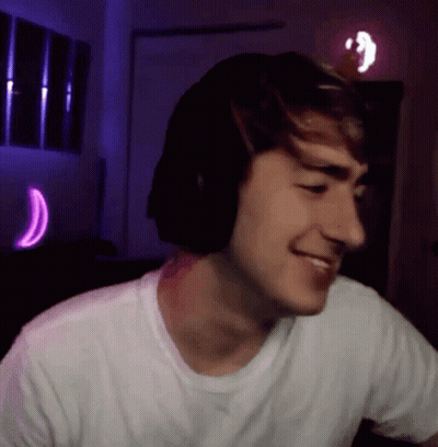 Young Man Smiling With Headphones GIF