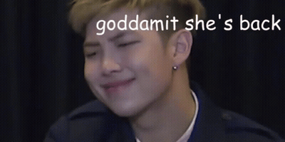 Young Man Smiling With Words Goddammit She's Back GIF