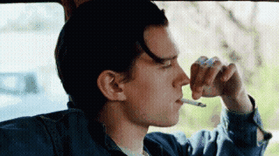 Young Man Smoking Cigarette In Car GIF