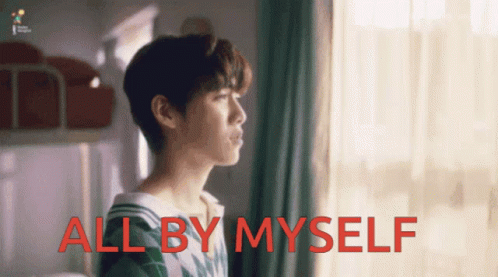 Young Man Standing By Window All By Myself GIF