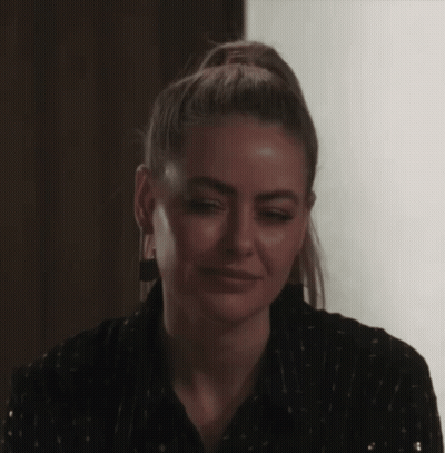 Young Man Standing With Crossed Arms GIF