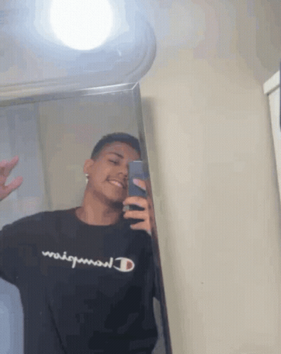 Young Man Taking Mirror Selfie In Black Champion Shirt GIF