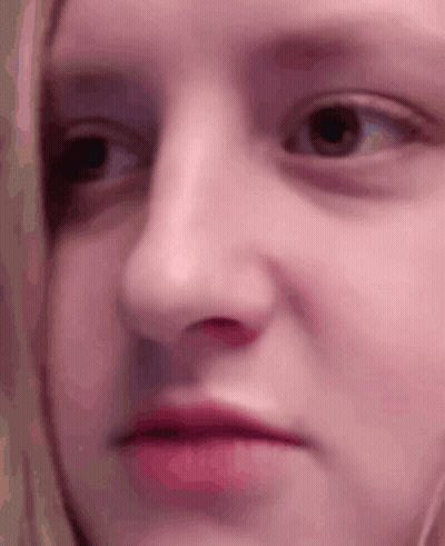 Young Man Taking Selfie In Bedroom GIF