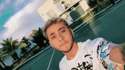 Young Man Taking Selfie In Front Of White House GIF