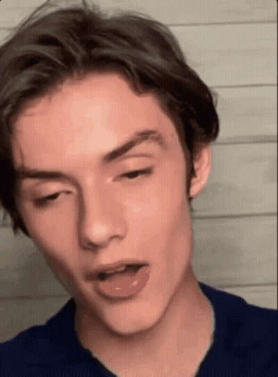 Young Man Tongue Out Close Up GIF