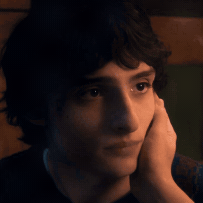 Young Man Touching Chin GIF