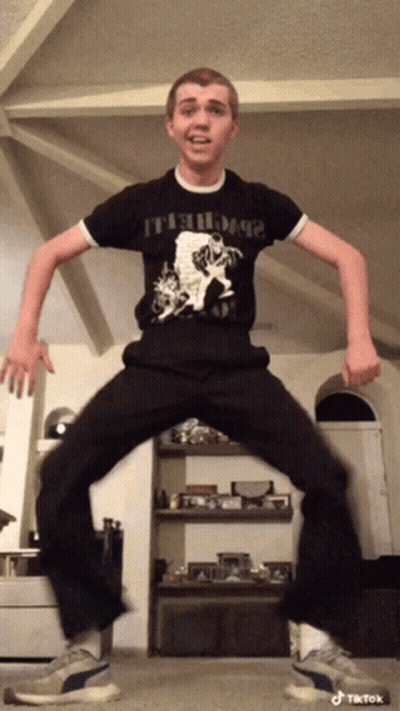 Young Man Wearing Black Shirt It S Dogs GIF