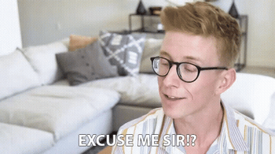 Young Man Wearing Glasses Saying Excuse Me GIF