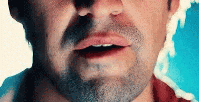 Young Man Wearing Green Bandana And Baseball Cap GIF