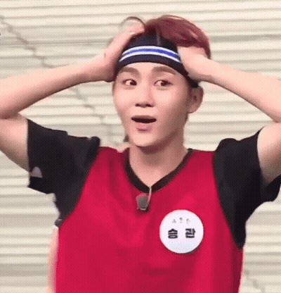 Young Man Wearing Headband Making Funny Face GIF