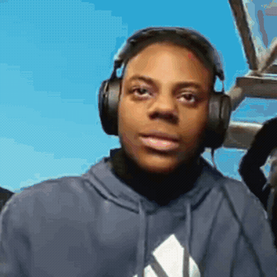 Young Man Wearing Headphones And Blue Sweatshirt GIF