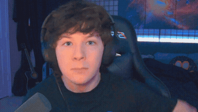 Young Man Wearing Headphones And R-Z Shirt GIF
