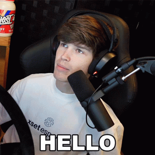 Young Man Wearing Headphones And White Shirt Says Hello GIF