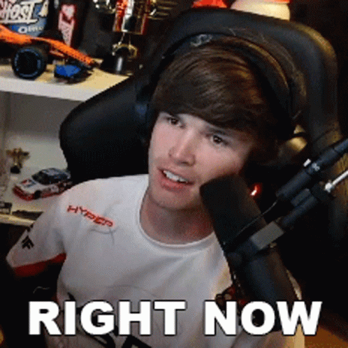 Young Man Wearing Headphones With Right Now Above Him GIF