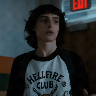 Young Man Wearing Hellfire Club Shirt GIF