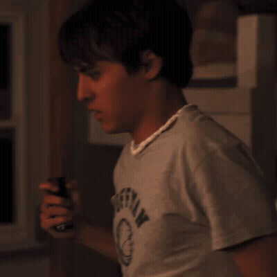 Young Man Wearing Offerman Grey Shirt GIF