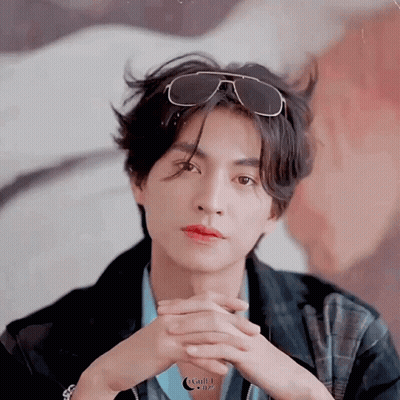 Young Man Wearing Sunglasses And Jacket GIF