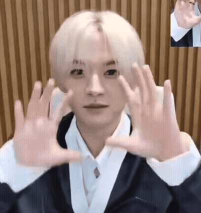 Young Man With Blonde Hair Making Funny Face GIF