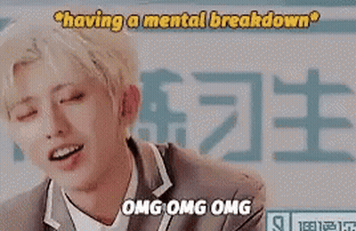 Young Man With Blonde Hair Sitting In Front Of Having A Mental Breakdown Sign GIF