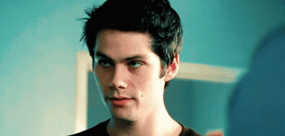 Young Man With Blue Eyes And Black Shirt GIF