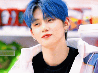 Young Man With Blue Hair And Earrings GIF